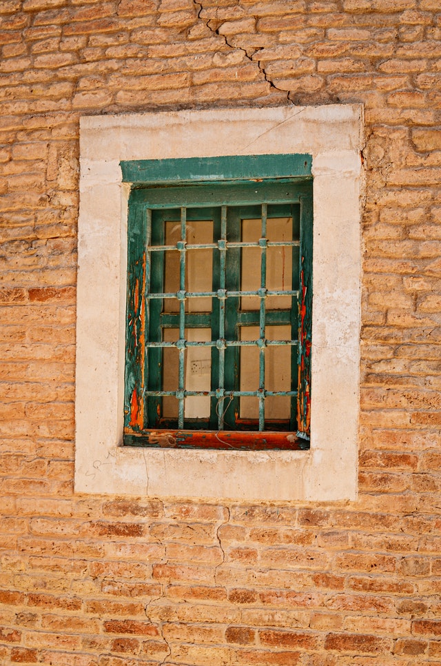 a window on a brick wall 2909934